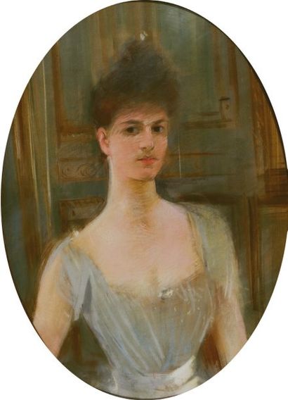 PAUL CÉSAR HELLEU (1859-1927). Portrait de femme en buste. Pastel de forme ovale....