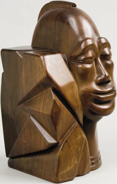 Ecole Belge 1940 Tête d'africain Sculpture en bois de fer en taille directe. Monogrammé...