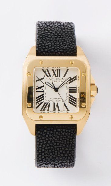 CARTIER - SANTOS 100. Montre de poignet en or jaune. Cadran blanc à chiffres romains....