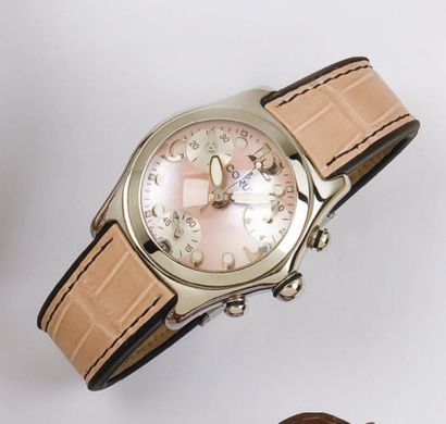 CORUM - BUBBLE PINK. Bracelet montre chronographe de dame en acier. Cadran à trois...