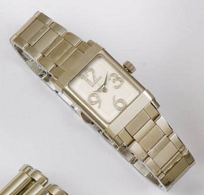 ETERNA - Bracelet montre de dame en acier. Index à chiffres arabes sertis de diamants....