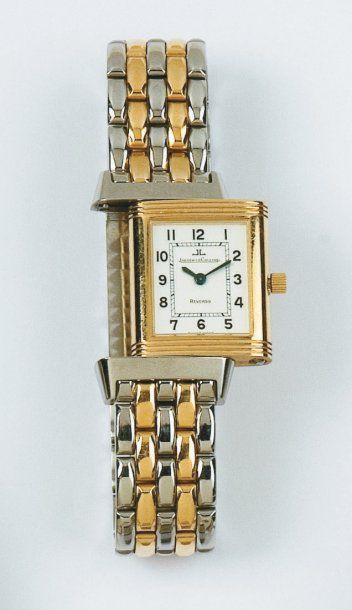 JAEGER LECOULTRE - REVERSO Bracelet montre de dame en or jaune et acier. Cadran blanc...