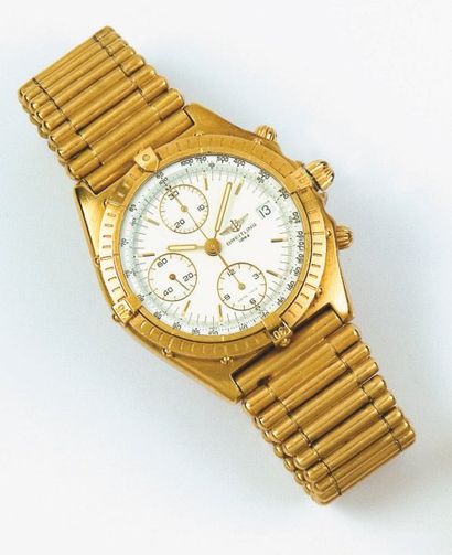 BREITLING - CHRONOMAT Bracelet montre chronographe en or jaune. Cadran blanc à 3...