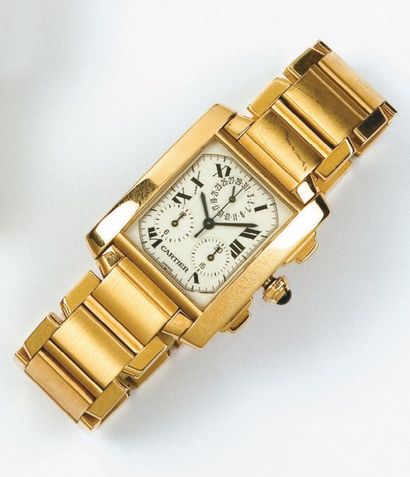 CARTIER - TANK FRANCAISE Bracelet montre chronographe en en or jaune. Cadran blanc...