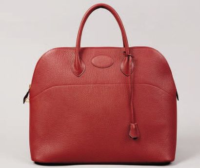 HERMES Paris made in France *Sac « Bolide « 44 cm de voyage en cuir grené rouge,...