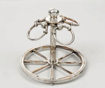 HERMÈS Paris Porte tampons en métal argenté figurant quatre anneaux d'attaches montés...