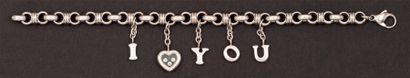 CHOPARD «I Love You» - Bracelet en or gris orné de breloques dont un coeur serti...