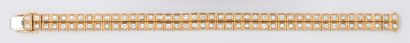 CHOPARD Bracelet souple en or jaune entièrement serti de deux lignes de diamants...