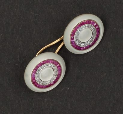 null Paire de boutons de manchettes en or jaune et or gris ornés de motifs ronds...