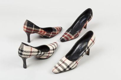 null BURBERRY

Lot de deux paires d'escarpins en laine tartan noir, rouge, blanche,...