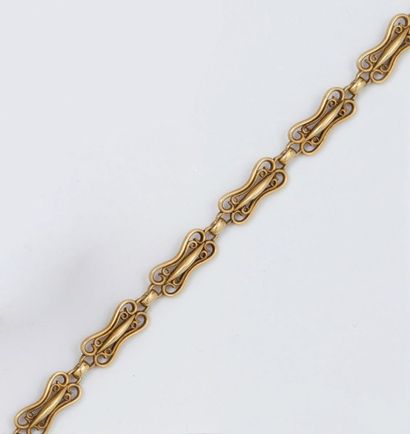 null Bracelet articulé en or jaune à maillons filigrané. Longueur : 19 cm. P. 17...