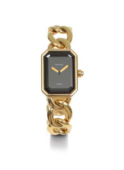 CHANEL PREMIERE Bracelet montre de dame en or jaune, le cadran noir. Mouvement à...