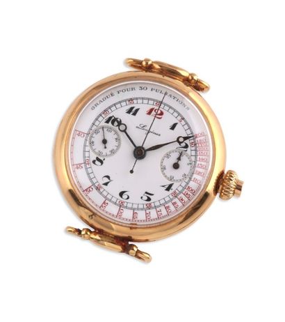 LONGINES Rare et beau chronographe bracelet en or jaune 18k (750).
Boîtier rond,...