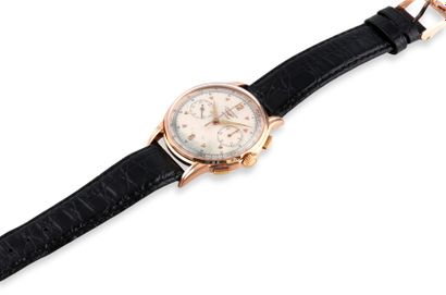 LONGINES Rare et beau chronographe bracelet en or rose 18K (750).
Boîtier rond.
Cadran...