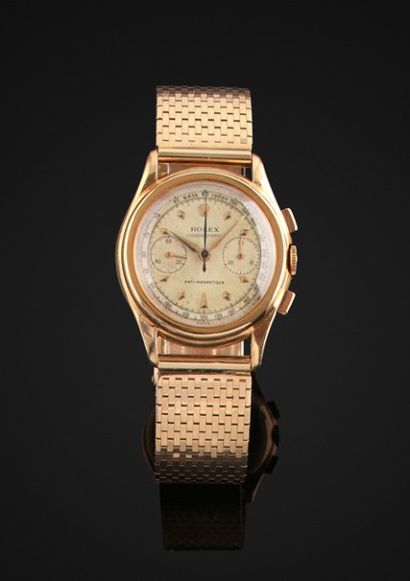 ROLEX Rare et beau chronographe bracelet en or jaune 18k (750)..
Boîtier rond. Poussoirs...