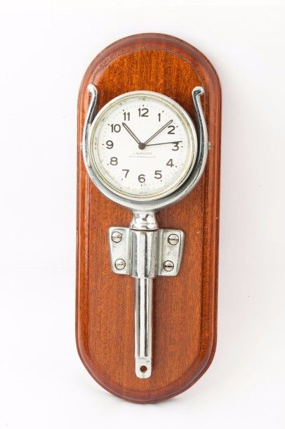 null J.AURICOSTE Horloger de la marine de l'état vers 1940

Montre de bord en acier....