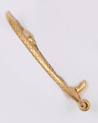 HERMES Bracelet jonc en or jaune tressé à décor de noeud.
Signé Hermès Paris. P....