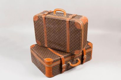 LOUIS VUITTON Lot de deux valises "Stratos" en toile monogram et cuir naturel. En...