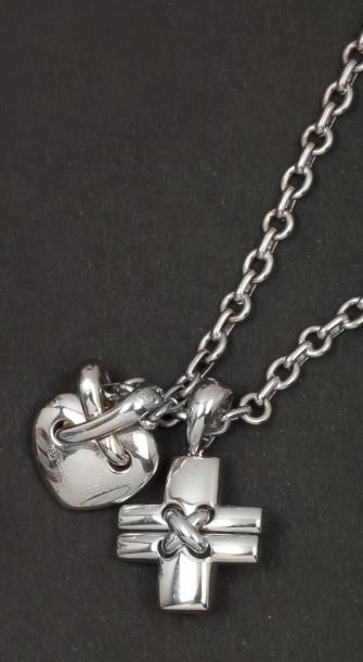 CHAUMET Collier en or gris orné de deux pendentifs «Croix et Coeur» en or gris
Signé...