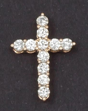 null Pendentif «Croix» en or jaune orné de diamants taillés en brillant
P. 2,3g.