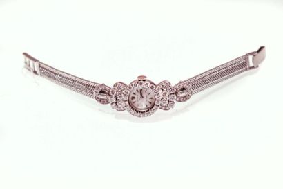 ROLEX - JOAILLERIE - Circa 1950. Belle montre bracelet de dame en or blanc 18k (750)....