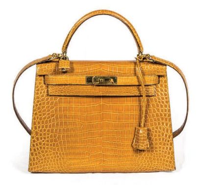 HERMÈS Paris made in France Sac «Kelly» 29 cm en crocodylus porosus A/1 safran, attaches...