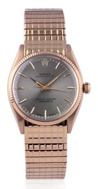ROLEX OYSTER PERPETUAL REF. 6564, GREY DIAL, PINK GOLD. «
CHOCOLATE PLATE»
Rolex,...