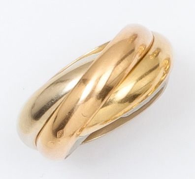 CARTIER-TRINITY Bague trois anneaux en or de trois couleurs.
Signée Cartier et numérotée.
Tour...