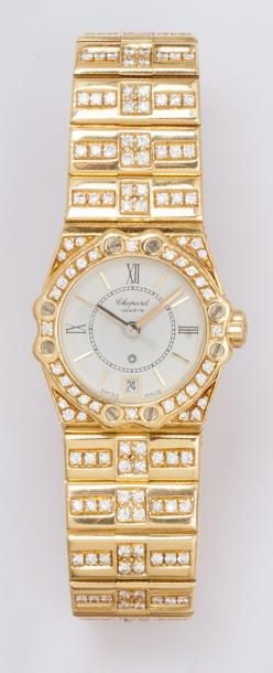 CHOPARD - ST MORITZ Bracelet- montre de dame en or jaune, la lunette et le bracelet...