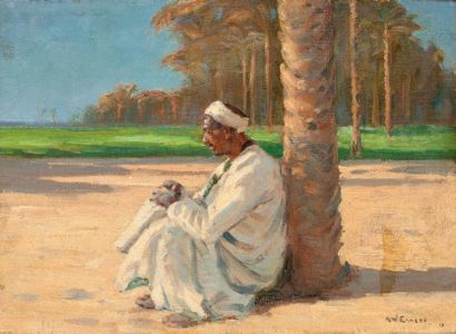 null R.WENES(XXème siècle) Arabe assis contre un cocotier Huile sur toile, signée...