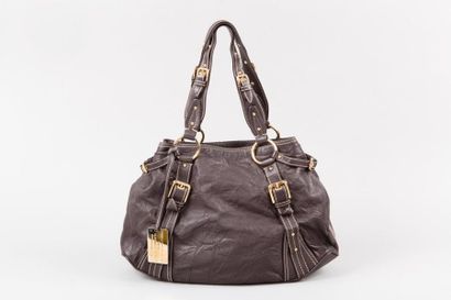 null DOLCE et GABANNA année 2005

Sac 45 cm en cuir agneau froissé moka, patte de...