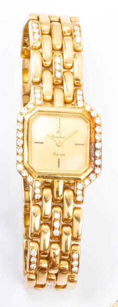 CAMBOUR Bracelet montre de dame en or jaune, cadran or, la lunette sertie de diamants...