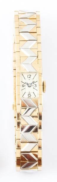 BOUCHERON Bracelet montre de dame en or jaune et or gris, mouvement mécanique, bracelet...