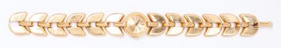 null BOUCHERON - Bracelet-montre en or jaune, cadran or, mouvement mécanique, bracelet...