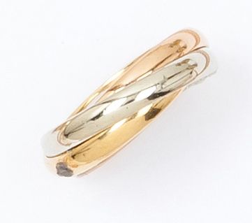 null CARTIER - "Trinity" - Bague trois anneaux en or de trois couleurs. Signé: Cartier....