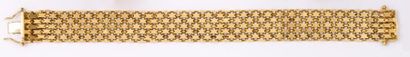 null Bracelet articulé en or jaune. P. 36,2 g