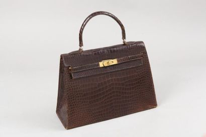 HERMES Paris *? Sac “Kelly Sellier” 32 en Crocodylus Porosus A/1 ébène, attaches...