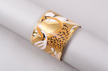 HERMÈS Paris made in France *Bracelet Méga
Large 58mm “Etriers” en métal doré émaillé.
Diamètre:...