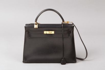 HERMES Paris made in France année 1973 *Sac “Kelly Sellier” 33cm en box noir, attaches...