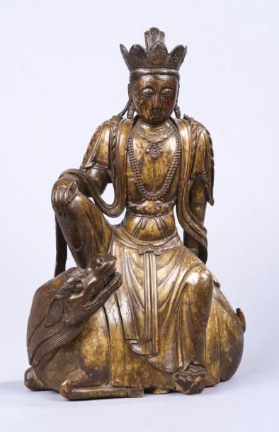 Chine, période Ming, XVIe siècle 
Groupe en bois anciennement laqué et doré, représentant...