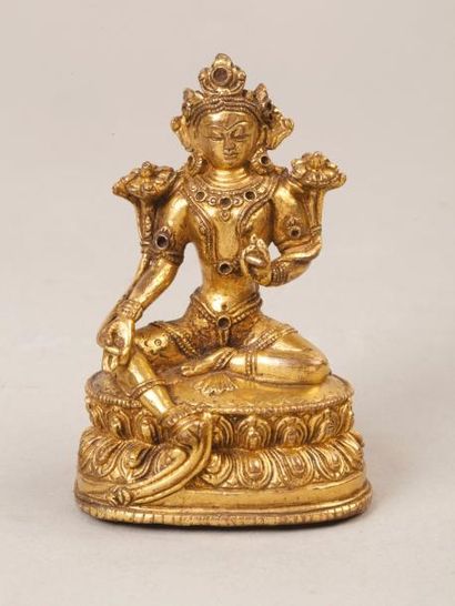CHINE 
Sujet en bronze doré représentant un boddisathva assis en position de délassement...
