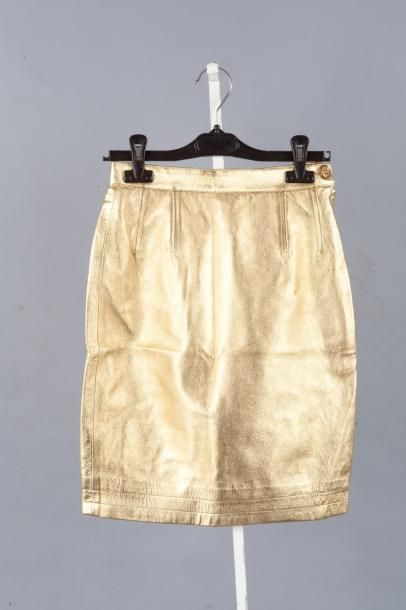 SAINT LAURENT Rive Gauche Mini-jupe en cuir irisé or. Taille 34