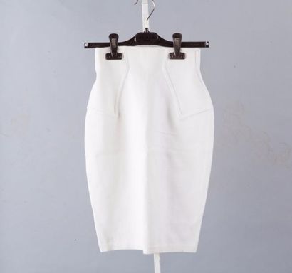 ALAÏA Lot en maille ivoire composé d'un body manches courtes et de trois jupes. Taille...
