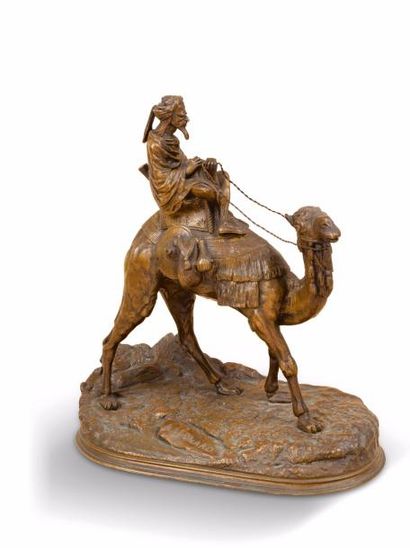 Alexandre LEONARD (1821-1877) (D'après) 
«Le méhariste».
Bronze à patine doré, signé...