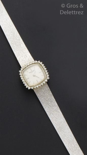 BERNEY & BLONDEAU Bracelet-montre de dame en or gris, la lunette sertie de diamants...