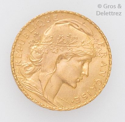 null Chaîne en or jaune et pendentif en or jaune orné d'une pièce de 10 francs français...