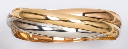 null CARTIER «Trinity» - Bracelet trois anneaux en or de trois couleurs. Signé Cartier....