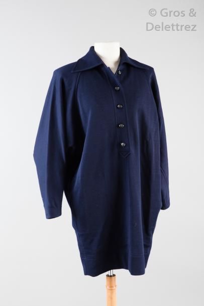 SAINT LAURENT Rive Gauche Petite robe en jersey de laine marine, col pointu sur simple...
