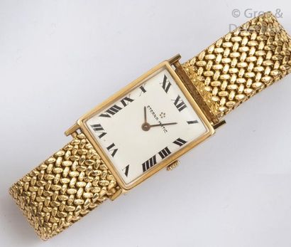 ETERNA «Matic» - Bracelet-montre en or jaune, boîtier rectangulaire, cadran gris...