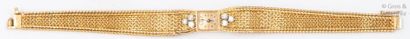 BLANCPAIN Bracelet montre de dame en or jaune. Cadran doré, index bâton. La lunette...